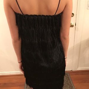A fringe strapless dress